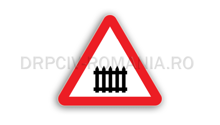 Trecere la nivel cu o cale ferată cu bariere sau semibariere